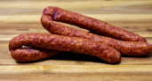 Онколог Карасев приравнял опасность копченой колбасы к пачке сигарет
